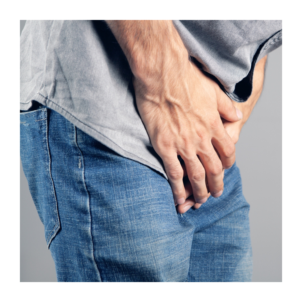 Man holding bladder area